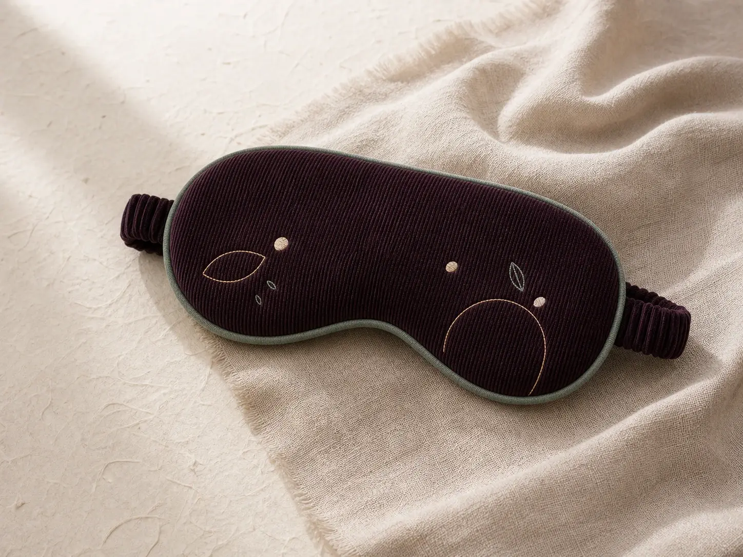 Concept deep plum corduroy sleep mask with abstract embroidery